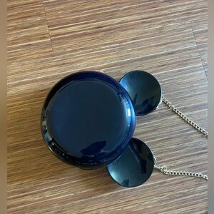 Mickey Mouse shaped purse with gold chain. All black